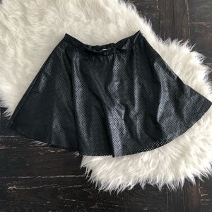 Faux leather perforated fur and flare skirt. Skirt